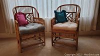 Pair of chairs with non-original tufted cushions in place