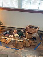 Full lot view showing salt lamp, wooden shelf, cork board pieces, baskets, turtle light, and other decor items