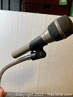 Side view of the Electro-Voice PL80 microphone attached to the silver gooseneck stand.