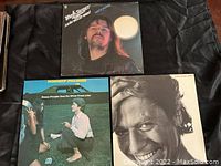 Top view showing the front covers of the three LP albums: Bob Seger, Robert Palmer, and an unknown artist.