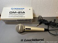 Pioneer DM-21A microphone with original box, cable and plug visible.