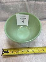 Top and inside view showing translucent pale green jadeite bowl with 7 inch diameter