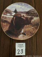 Front view of the collector plate depicting a German Shorthaired Pointer dog in a rural setting.