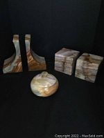 All five items displayed against black background