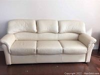 Front view of entire sofa against wall