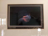 Close-up of the photographic print showing the wave and signature