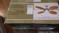 Image showing the box of the Home Maison Scandinavian 42" Ceiling Fan with branding and product illustration visible.