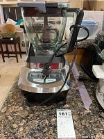 Full view of Ninja blender base unit on counter with power cord visible