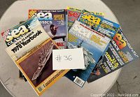Five Sea Classics magazines including a 1978 Yearbook laid out showing covers with ships images and magazine titles.