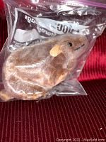 Ty Beanie Baby Tiptoe the Mouse plush kept in clear plastic Ziploc bag showing intact tags and condition