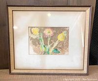 Frontal image of the framed monotype artwork depicting floral subjects.