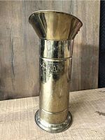 Front view of tall polished brass umbrella stand with flared rim, engraved '5 Kan' on the body.