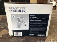 Box front showing Kohler Fairfax K-12182-CP single-handle bathroom sink faucet, polished chrome