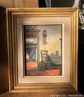 Full view of the framed oil painting showing a fireplace, chair, clock, and table