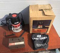 Craftsman Super Router with original box, dust collection bag, wrenches, and router bit case