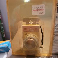 Photo of an Intermatic wall switch security timer inside clear plastic packaging showing model 49001Z, slightly used condition, $21.99 price tag.