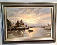Framed oil painting with harbor boats and cloudy sky, signed W. Kroon