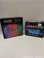 Two boxed RGB LED strip light sets; one Govee brand and one unbranded 12V strip light on a plain background.