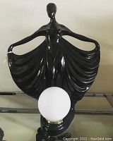 Full front view of lamp showing overall design and condition