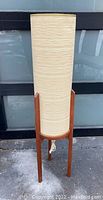 Full front view of the lamp showing shade and base