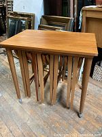 Full view of rectangular table with nested smaller table underneath
