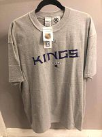 Front view of grey XL shirt with 'KINGS' text and CCM and NHL logos on tags.