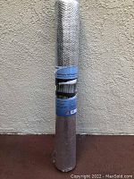Full view of sealed roll with label showing reflective bubble wrap material