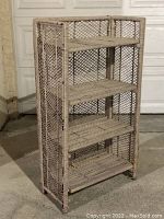 Full view of the four-shelf wicker folding shelf unit showing the woven wicker surfaces and lattice sides.