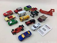 Top down view showing all 15 Matchbox toy vehicles in an array