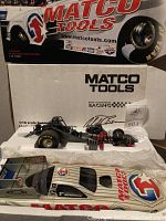 Limited edition 1:16 scale Matco Tools Funny Car model in original box, packaging includes inner foam support with model signed and numbered 803 of 1,250 units.