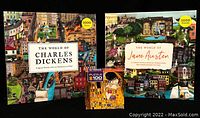 Photo of three boxes showing title and artwork of puzzles: The World of Charles Dickens, The World of Jane Austen, and Gustav Klimt's The Kiss