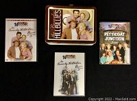 Photo showing the Beverly Hillbillies metal lunchbox along with three DVD cases: two Beverly Hillbillies and one Petticoat Junction