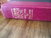 Close-up photo of the book spine showing embossed gold text with the title and date range Nov. 1974 to Jan. 1978