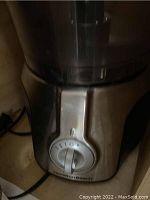 Close-up photo of Hamilton Beach food processor base and speed dial.