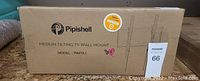 Closed cardboard box labeled Pipishell Medium Tilting TV Wall Mount, Model PIMTK1, designed for 23-55 inch TVs.