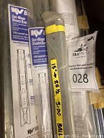 Two packages and one bundle of side-mount drawer slides visible, with packaged KV 8400 slides labeled 100-pound rating.