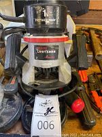 Front view of Sears Craftsman fixed-base router showing 2 horsepower motor and handles.