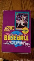 Purple 1991 Score Series 2 Baseball wax box featuring a Kevin Maas player card image on the front with text about content.