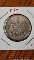 Obverse side showing Queen Elizabeth II's portrait and inscription.