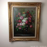 Full front view of framed floral still life painting