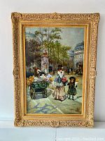 Frontal view of oil painting and gilded frame