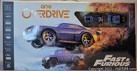 Front view of original Anki OverDrive Fast & Furious edition box showcasing two car models and package art.