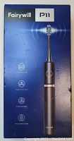 Photo of boxed Fairywill P11 sonic electric toothbrush showing key features on front of box including maglev drive, 3 modes, fast charge.