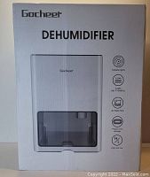 Box of Gocheer Dehumidifier showing product image, brand, and key features: variable lights, timer for 1/24 hours, 1L capacity at 86°F and 80% humidity, 4L water tank, power cord storage, and high/low settings.