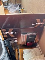Box with one Keurig coffee maker, box labeled K Supreme