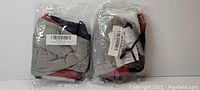 Two sealed packages each containing four triple-layer face masks visible through packaging in multiple colors (grey, red, black, blue).