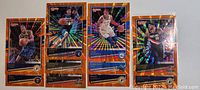 Set of 10 Panini Donruss 2020-2021 NBA basketball cards featuring players with flashy orange borders, laid out side-by-side, showing the holographic design on the borders and player imagery.