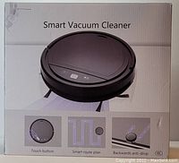 Box of a black smart vacuum cleaner showing product image and features: touch button, smart route plan, and backwards anti-drop.