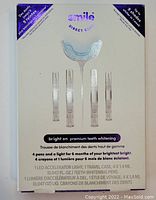 Photo of the unopened Smile Direct Club Bright On Premium Teeth Whitening kit showing box front with product description and images of 4 pens and 1 LED light mouth tray.