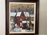 Full view of framed winter street scene painting